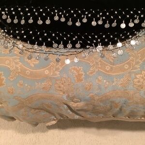 Velvet sarong decorated with silver triple row coins. New condition